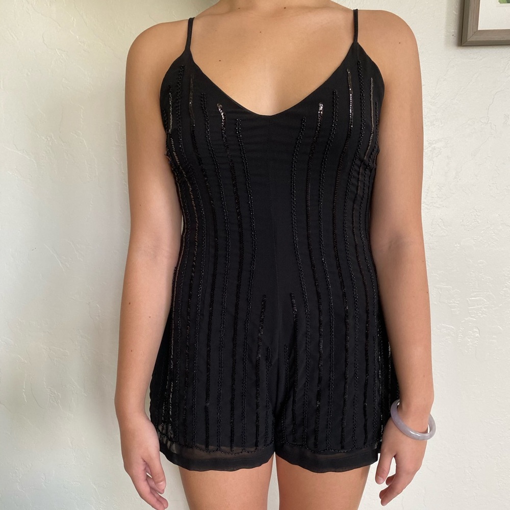 Sequenced black spaghetti strap romper